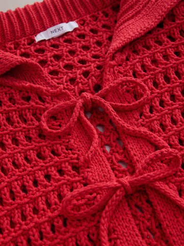 sarkans Next Adīta jaka