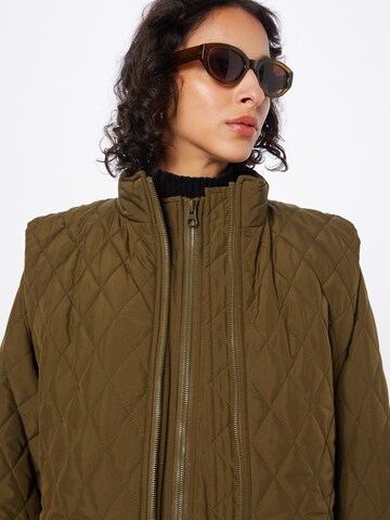 Manteau mi-saison 'Sienna' co'couture en vert