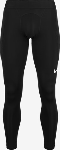 NIKE Skinny Workout Pants in Black: front