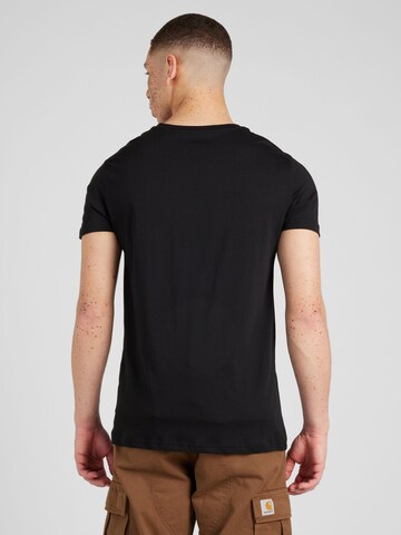 Coupe regular T-Shirt ALPHA INDUSTRIES en noir