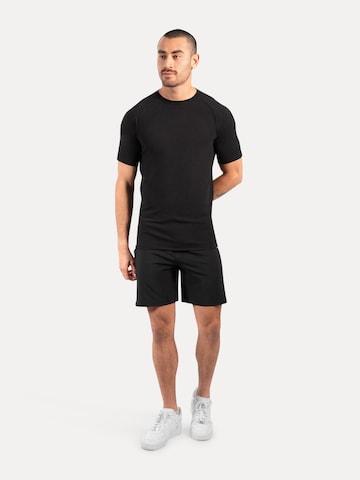 Smilodox Regular Sports trousers in Black