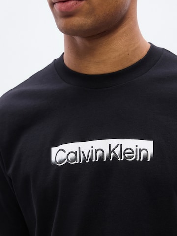 Calvin Klein Bluser & t-shirts i sort