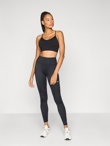 NIKE Бюстие Спортен сутиен в черно