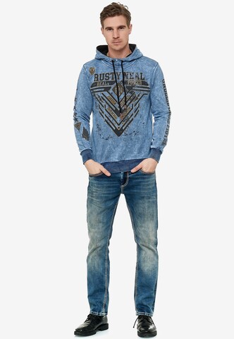 Rusty Neal Sweatshirt mit Oil Washed Front Print in Blau