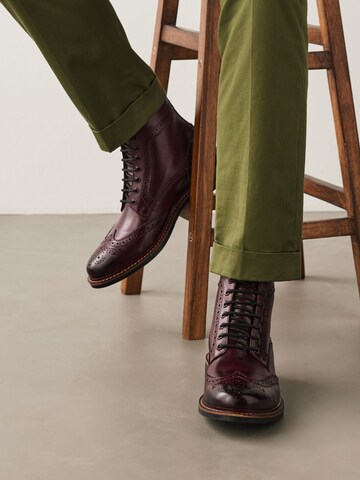 Boots stringati di Next in rosso