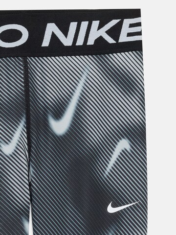 NIKE Skinny Sports trousers in Black