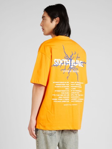 Sixth June T-shirt 'THUNDER' i orange: framsida