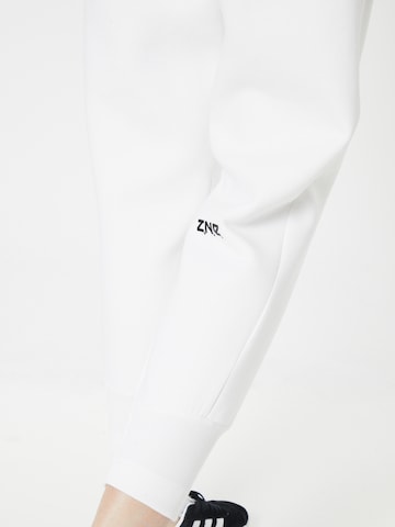 ADIDAS SPORTSWEAR Tapered Sports trousers 'Z.N.E.' in White