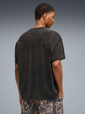 Maglietta 'Puma Dylan Wildcat Tee II' di PUMA in nero