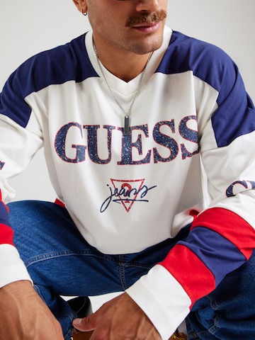 GUESS JEANS Tričko 'HOCKEY' – bílá