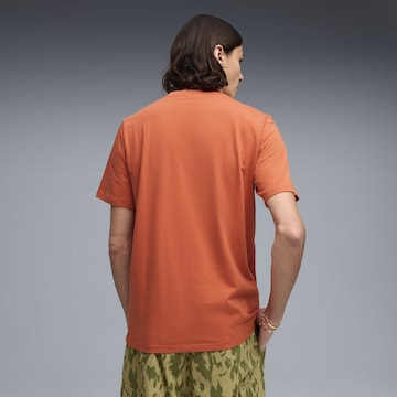 PUMA Shirt 'Porsche Legacy Essentials' in Orange