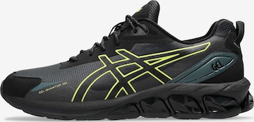 Baskets basses ASICS SportStyle en noir : devant