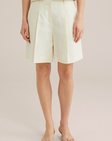 WE Fashion Loose fit Trousers with creases in Beige