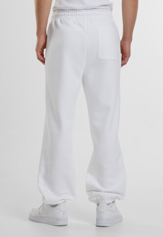Tapered Pantaloni di Urban Classics in bianco
