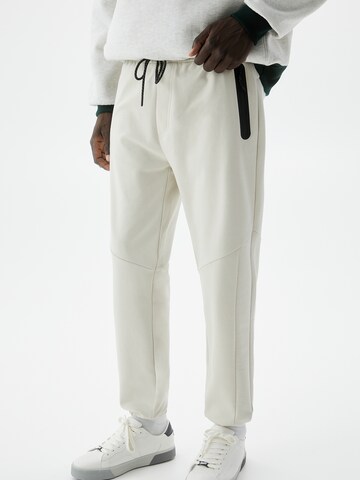 Pull&Bear Tapered Pants in Beige: front