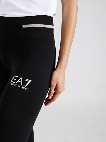 EA7 Emporio Armani - Acampanado Pantalón en negro