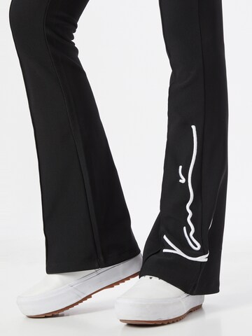 Karl Kani - Acampanado Pantalón en negro