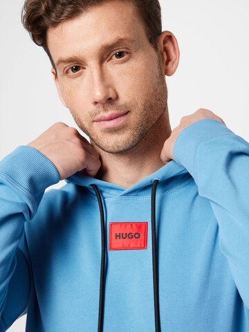 HUGO Sweatshirt 'Daratschi214' i blå