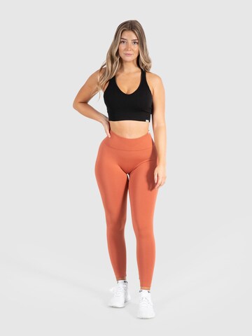 Smilodox Skinny Workout Pants 'Amaze Pro' in Orange