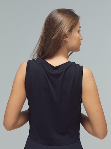 DRILLS Apparel - Top deportivo 'FLXFLOW Layer Top' en negro