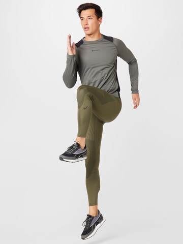 ASICSSkinny Sportske hlače 'ROAD BALANCE' - zelena boja