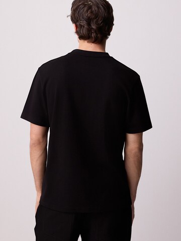 Tricou de la Next pe negru