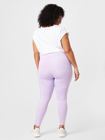 Reebok - Skinny Calças de desporto em roxo