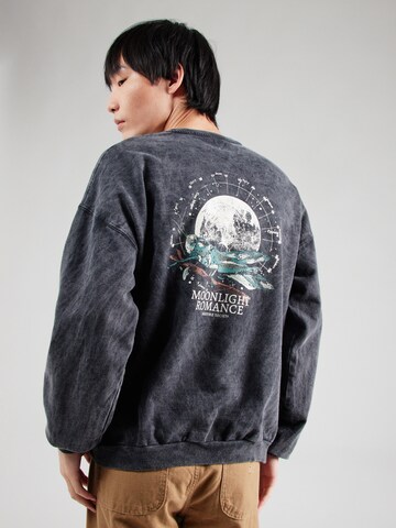 Sweat-shirt 'MOONLIGHT ROMANCE' Kaotiko en noir : devant
