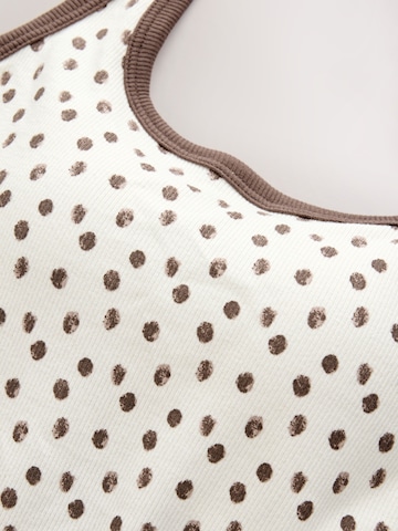 Haut Next en beige
