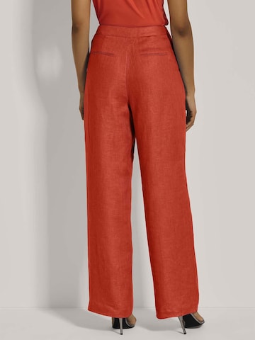 MADELEINE Wide leg Bandplooibroek in Oranje