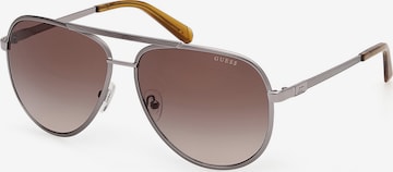 Lunettes de soleil GUESS en gris : devant