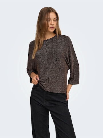 ONLY - Camiseta 'ONLCAROL' en marrón: frente