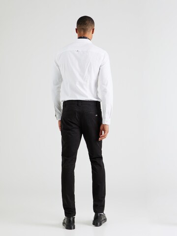 Slimfit Pantaloni chino 'Scanton' di Tommy Jeans in nero
