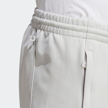 ADIDAS ORIGINALS Tapered Workout Pants 'Rekive' in Grey