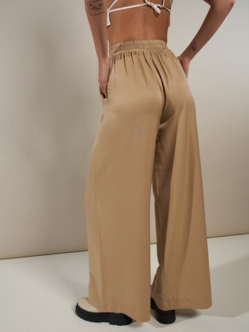 ABOUT YOU x Laura Giurcanu Wide leg Pants 'Melis' in Brown