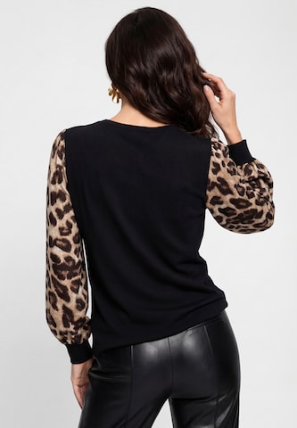 faina - Sweatshirt 'Casual' em preto
