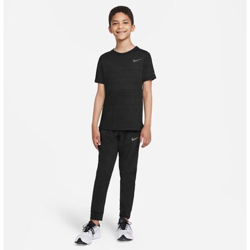 NIKE Regular Workout Pants in Black