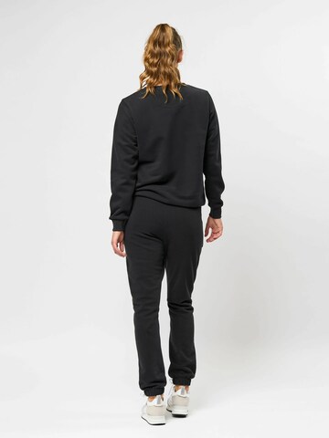 U.S. POLO ASSN. Tapered Housut 'India' värissä musta