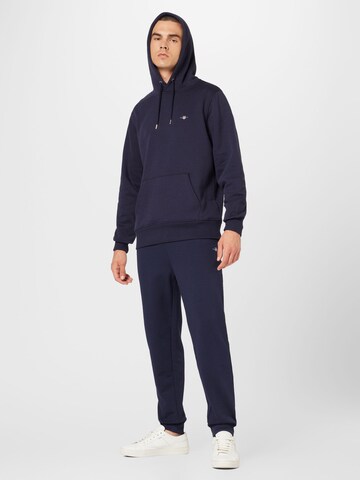 GANT Tapered Housut värissä sininen