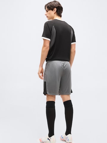 PUMA Regular Sportbroek 'TeamLIGA26' in Grijs