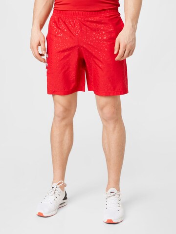 UNDER ARMOUR Regular Workout Pants in Red: front