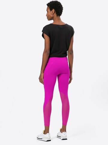 PUMA Skinny Workout Pants in Purple