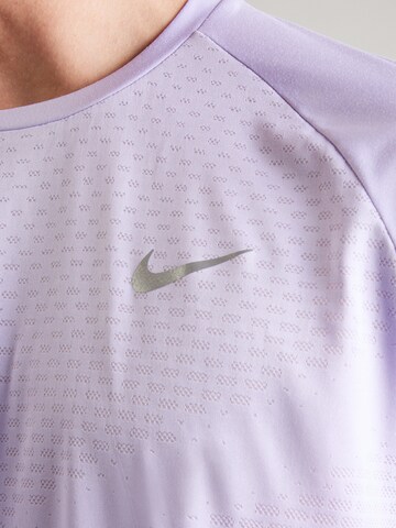 NIKE Koszulka funkcyjna 'ADV STRIDE' w kolorze fioletowy