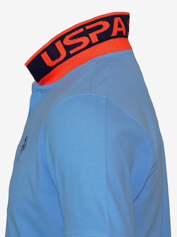 Maglietta 'CAAD' di U.S. POLO ASSN. in blu