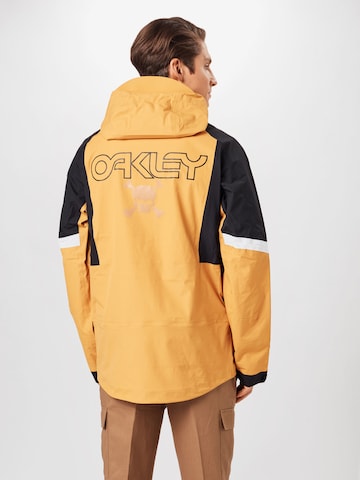 OAKLEY - Regular Fit Casaco outdoor 'GUNN SHELL' em amarelo