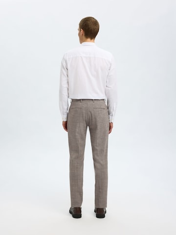Slimfit Pantaloni '16087871' di SELECTED in beige