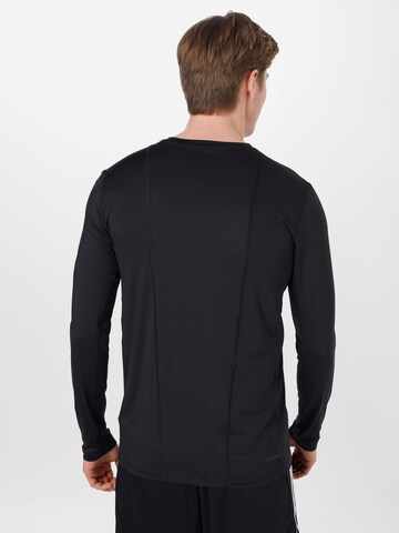 Skinny T-Shirt fonctionnel ADIDAS SPORTSWEAR en noir