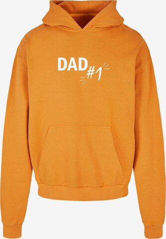 Merchcode Sweatshirt 'Fathers Day - Dad number 1' in Oranje: voorkant