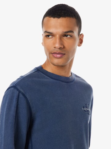 Calvin Klein JeansSweater majica - plava boja