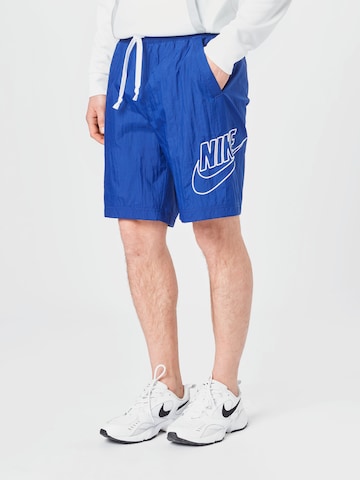 Nike Sportswear Pants 'Alumni' in Blue: front